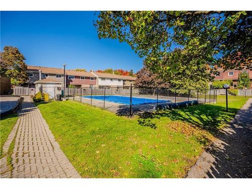 31-423 Westwood Drive, Kitchener, ON - Outdoor With In Ground Pool With Backyard