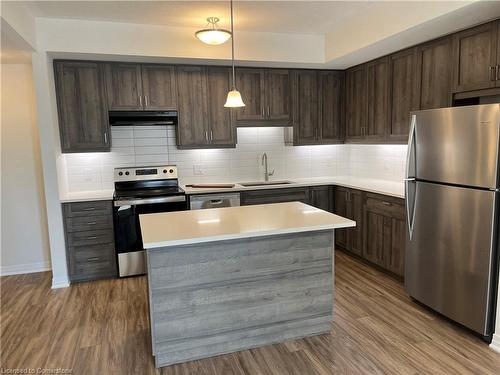 10-142 Foamflower Place, Waterloo, ON - Indoor Photo Showing Kitchen With Stainless Steel Kitchen With Upgraded Kitchen