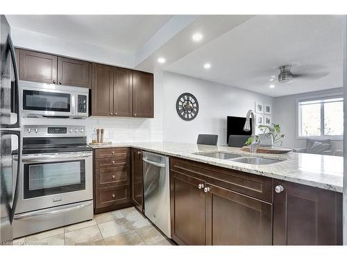 206-271 Eiwo Court, Waterloo, ON - Indoor Photo Showing Kitchen With Double Sink