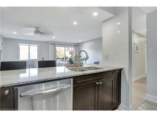 206-271 Eiwo Court, Waterloo, ON - Indoor Photo Showing Kitchen With Double Sink