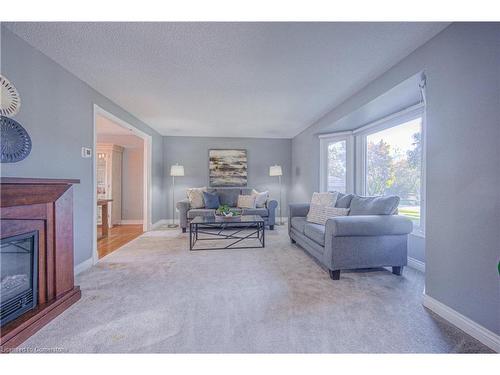 96 Grand River Boulevard, Kitchener, ON - Indoor Photo Showing Living Room With Fireplace