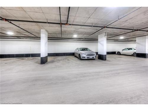 201-155 St Leger Street, Kitchener, ON - Indoor Photo Showing Garage