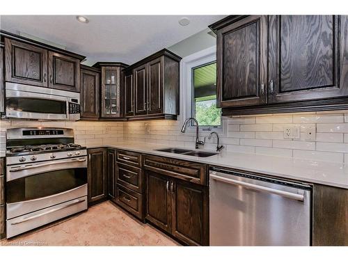 174 River Run Road, Drayton, ON - Indoor Photo Showing Kitchen With Double Sink