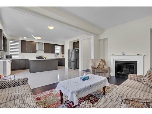 58 Mary Watson Street, Ayr, ON - Indoor Photo Showing Living Room With Fireplace