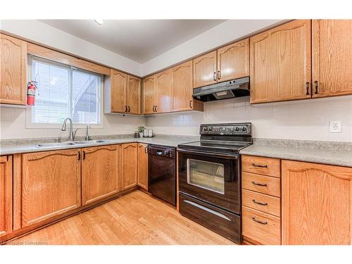 563 Hallmark Drive, Waterloo, ON - Indoor Photo Showing Kitchen With Double Sink