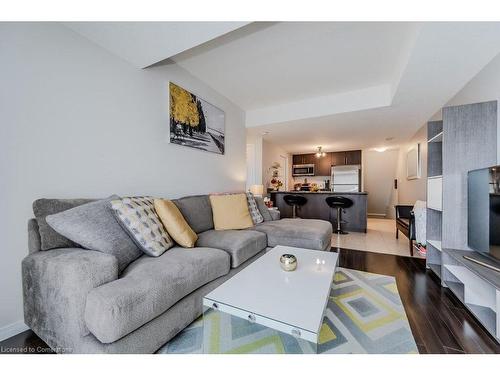 D-1652 Fischer Hallman Road, Kitchener, ON - Indoor Photo Showing Living Room With Fireplace