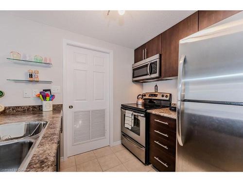 D-1652 Fischer Hallman Road, Kitchener, ON - Indoor Photo Showing Kitchen With Stainless Steel Kitchen With Double Sink