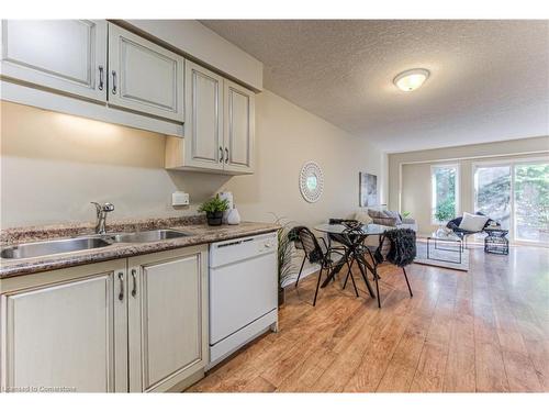 E29-85 Bankside Drive, Kitchener, ON - Indoor Photo Showing Kitchen With Double Sink