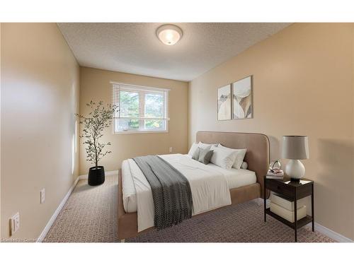 E29-85 Bankside Drive, Kitchener, ON - Indoor Photo Showing Bedroom