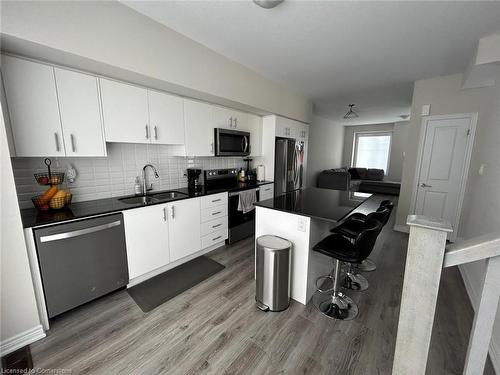 142-10 Birmingham Drive, Cambridge, ON - Indoor Photo Showing Kitchen With Stainless Steel Kitchen With Double Sink