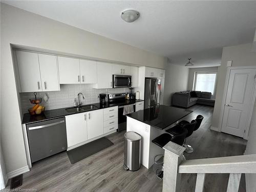 142-10 Birmingham Drive, Cambridge, ON - Indoor Photo Showing Kitchen With Stainless Steel Kitchen With Double Sink