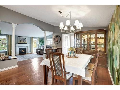 102 Bushmill Circle, Freelton, ON - Indoor Photo Showing Dining Room With Fireplace