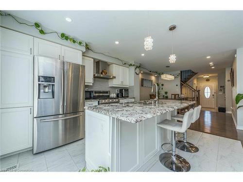 310 Jean Landing, Milton, ON - Indoor Photo Showing Kitchen With Upgraded Kitchen