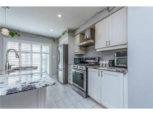 310 Jean Landing, Milton, ON - Indoor Photo Showing Kitchen With Upgraded Kitchen