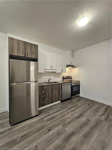 206-1434 Highland Road W, Kitchener, ON - Indoor Photo Showing Kitchen With Stainless Steel Kitchen