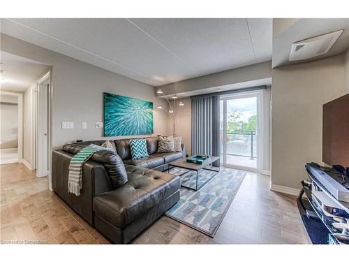 208-155 Commonwealth Street, Kitchener, ON - Indoor Photo Showing Living Room