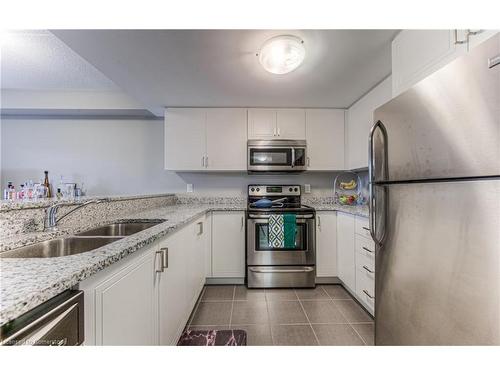 208-155 Commonwealth Street, Kitchener, ON - Indoor Photo Showing Kitchen With Double Sink