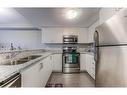 208-155 Commonwealth Street, Kitchener, ON  - Indoor Photo Showing Kitchen With Double Sink 