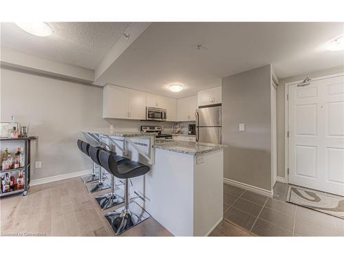 208-155 Commonwealth Street, Kitchener, ON - Indoor Photo Showing Kitchen With Upgraded Kitchen