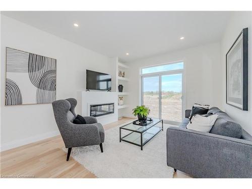 126 South Parkwood Boulevard, Elmira, ON - Indoor Photo Showing Living Room With Fireplace