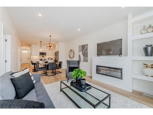 126 South Parkwood Boulevard, Elmira, ON - Indoor Photo Showing Living Room With Fireplace