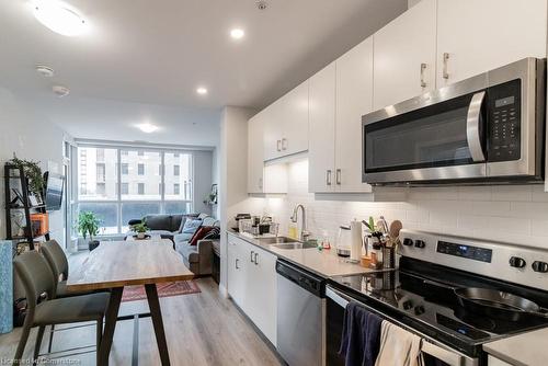 404-104 Garment Street, Kitchener, ON - Indoor Photo Showing Kitchen With Stainless Steel Kitchen With Double Sink With Upgraded Kitchen