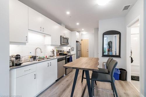 404-104 Garment Street, Kitchener, ON - Indoor Photo Showing Kitchen With Stainless Steel Kitchen With Double Sink With Upgraded Kitchen