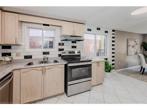 83 Moss Place, Guelph, ON - Indoor Photo Showing Kitchen With Double Sink