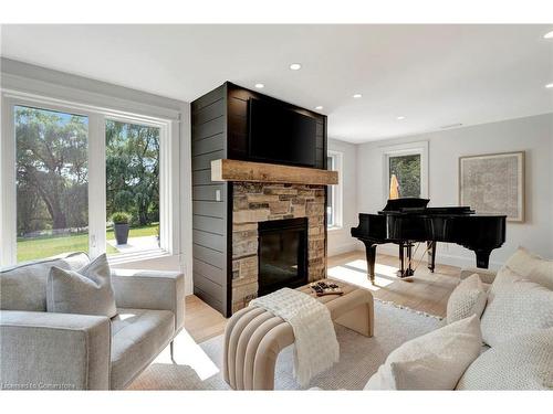 14 Welsh Drive, Ayr, ON - Indoor Photo Showing Living Room With Fireplace