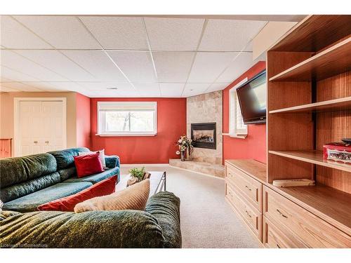 1-414 Craigleith Drive, Waterloo, ON - Indoor Photo Showing Living Room With Fireplace