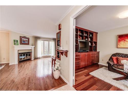 1-414 Craigleith Drive, Waterloo, ON - Indoor Photo Showing Living Room With Fireplace