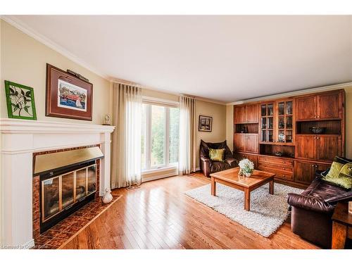 1-414 Craigleith Drive, Waterloo, ON - Indoor Photo Showing Living Room With Fireplace