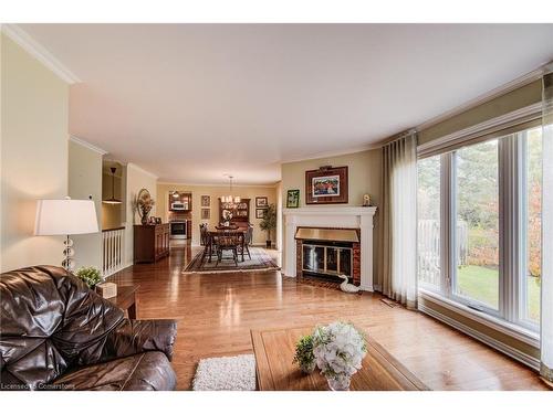 1-414 Craigleith Drive, Waterloo, ON - Indoor Photo Showing Living Room With Fireplace