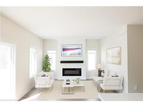 21-575 Albert Avenue N, Listowel, ON - Indoor Photo Showing Living Room With Fireplace