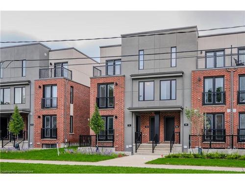 52-99 Roger Street, Waterloo, ON - Outdoor With Balcony With Facade