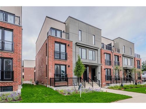 52-99 Roger Street, Waterloo, ON - Outdoor With Balcony With Facade