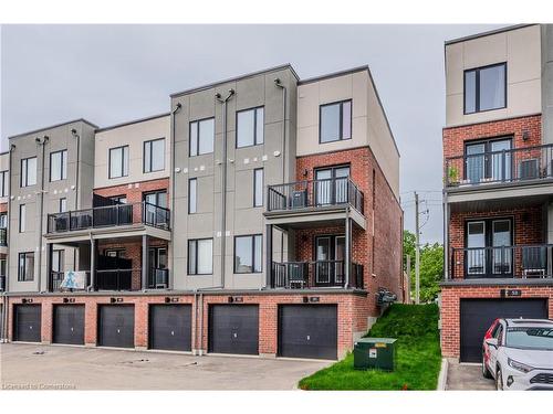 52-99 Roger Street, Waterloo, ON - Outdoor With Balcony With Facade