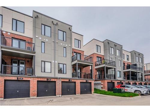 52-99 Roger Street, Waterloo, ON - Outdoor With Balcony With Facade