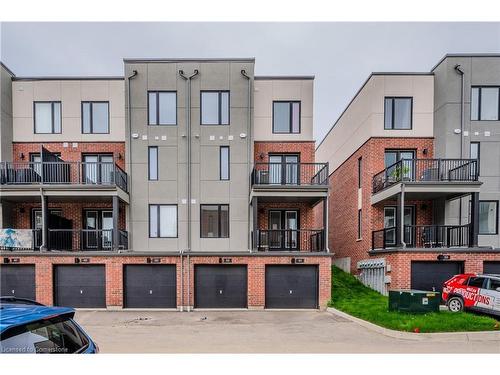 52-99 Roger Street, Waterloo, ON - Outdoor With Balcony With Facade