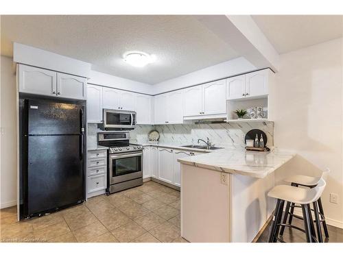 310 Fallowfield Drive, Kitchener, ON - Indoor Photo Showing Kitchen With Double Sink