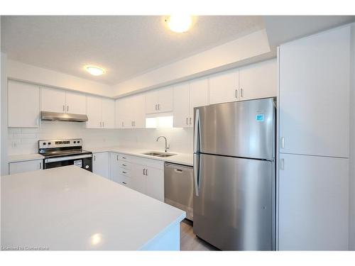 C145-580 Benninger Drive, Kitchener, ON - Indoor Photo Showing Kitchen With Double Sink