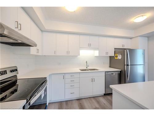 C145-580 Benninger Drive, Kitchener, ON - Indoor Photo Showing Kitchen With Double Sink