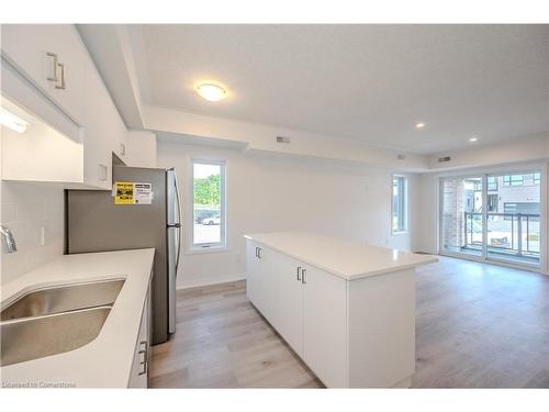 C145-580 Benninger Drive, Kitchener, ON - Indoor Photo Showing Kitchen With Double Sink