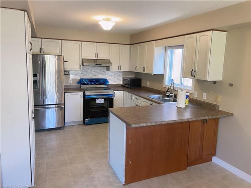 402 Pastern Trail, Waterloo, ON - Indoor Photo Showing Kitchen With Double Sink