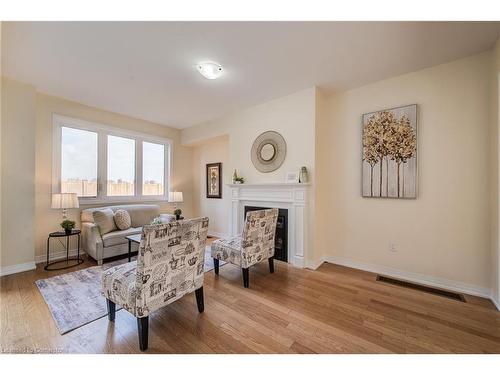 137 Huntingford Trail, Woodstock, ON - Indoor Photo Showing Living Room With Fireplace