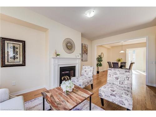 137 Huntingford Trail, Woodstock, ON - Indoor Photo Showing Living Room With Fireplace