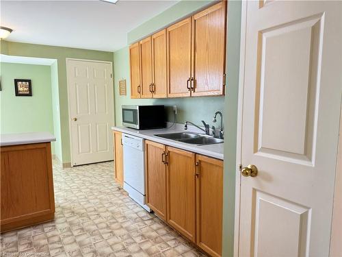 608-265 Westcourt Place, Waterloo, ON - Indoor Photo Showing Kitchen With Double Sink