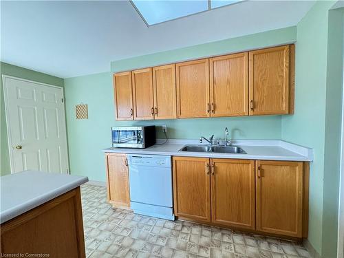 608-265 Westcourt Place, Waterloo, ON - Indoor Photo Showing Kitchen With Double Sink