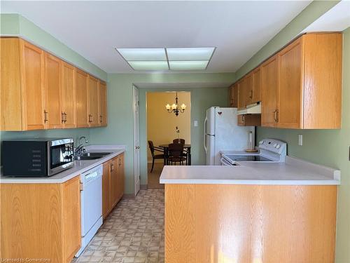 608-265 Westcourt Place, Waterloo, ON - Indoor Photo Showing Kitchen With Double Sink