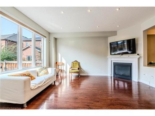 1108 Savoline Boulevard, Milton, ON - Indoor Photo Showing Living Room With Fireplace